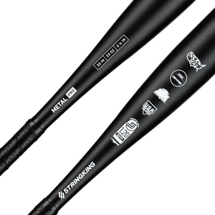 Two black StringKing Metal Pro (-10) Fastpitch Softball Bats (SKMTLPRFP10) feature white logos, text, certification stamps on the barrels, and textured black handles for enhanced grip—ideal for fastpitch softball.