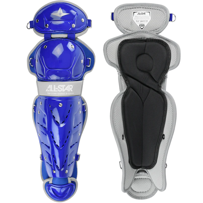 Two All Star Top Star Catcher's Leg Guards (LG-TS) are shown: the left displays a shiny blue and silver shell, while the right shows the soft, padded gray and black interior. Double-knee design enhances protection for youth players.