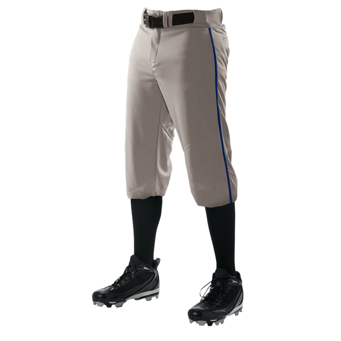 A person is wearing Alleson Adult Crush Knicker Baseball Pants with Piping (655PKB) by Alleson—gray double-knit polyester pants with a blue side stripe—paired with a black belt, black knee-high socks, and black cleats. Upper body not visible.