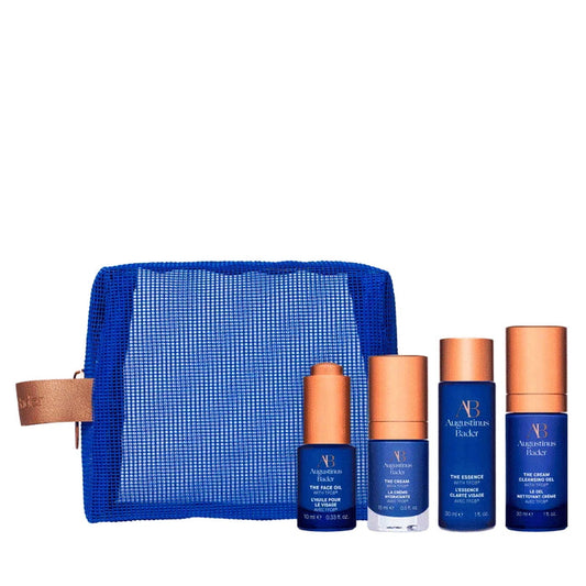 Augustinus Bader starter kit with blue travel pouch, The Cream, cleanser, essence, and face oil
