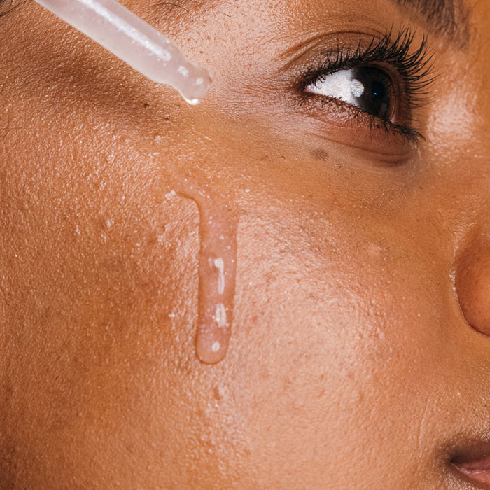 Dropper dispensing Breakout Clearing Liquid Peel onto face