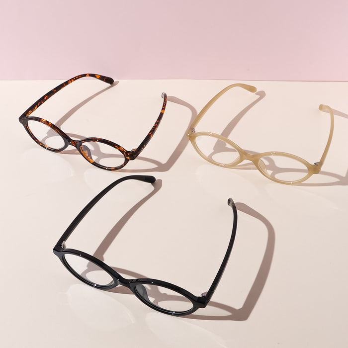 Eyecandys Cassian Unisex Oval Full Frame Glasses in Tortoiseshell, Black, and Beige, made from high-quality TR material for a lightweight, comfortable fit. Ideal for those seeking both durability and style