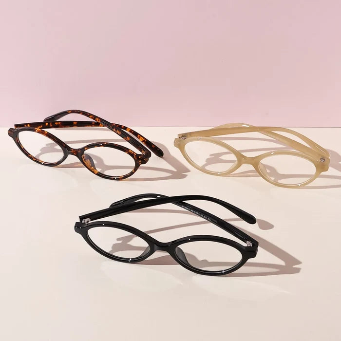 EyeCandys Cassian Unisex Oval Full Frame Glasses in tortoiseshell. Sleek and modern design with lightweight TR material, offering durable and comfortable eyewear for everyday use