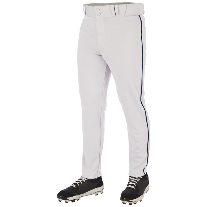 A person wears Champro Sports Triple Crown 2.0 Tapered Baseball Pants with piping (BP66) and black cleats, shown waist down on a white background. The pro-weight pants offer durability, style, and a dark side stripe for a modern look.