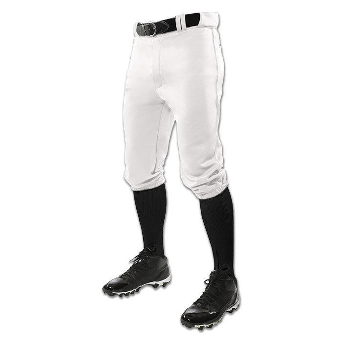 A person wears Champro Sports Champro Adult Triple Crown Knicker Baseball Pants (BP10A) in white, paired with a black belt, black knee-high socks, and black cleats, shown waist down against a white background.
