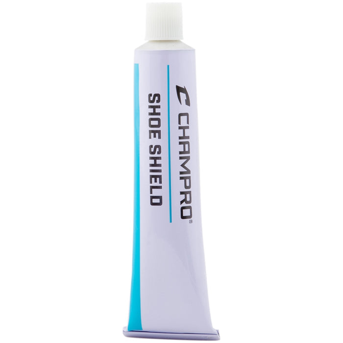 A tube of Champro Sports Shoe Shield Foot Protection (A037), a reliable protector for fastpitch pitchers, stands upright with a white cap and blue and black text against a light purple background.