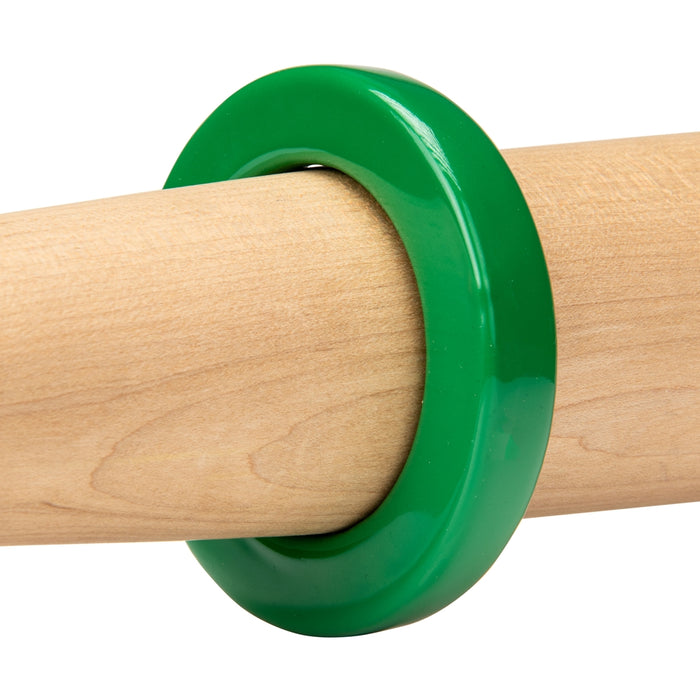 The Champro Sports Bat Weights (A014-A019) are shiny green plastic rings that fit around light wooden training bats, contrasting their smooth surfaces and making them perfect for powerful swings during warm-up sessions.