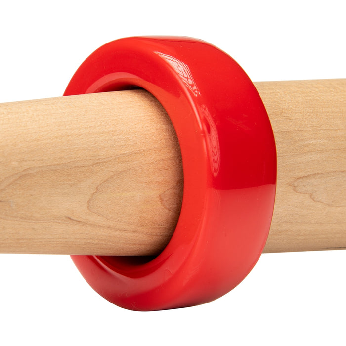 The Champro Sports Bat Weights (A014-A019) are glossy, thick red plastic rings designed to fit snugly around a light wood training bat, making them ideal for warm-ups and building stronger swings.