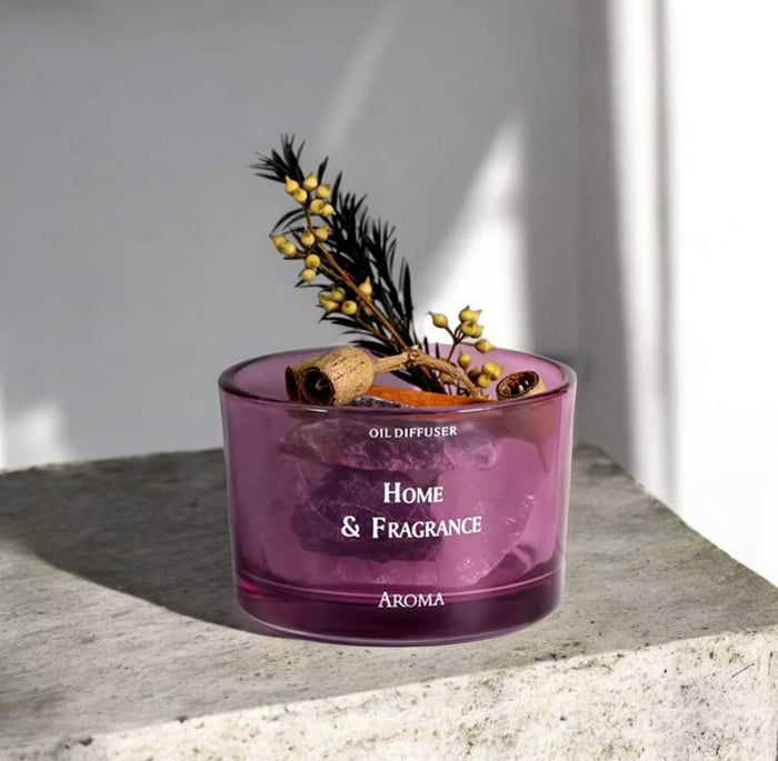 Crystal Aroma Home Scent Stone Diffuser displayed with natural elements in a stylish purple container.