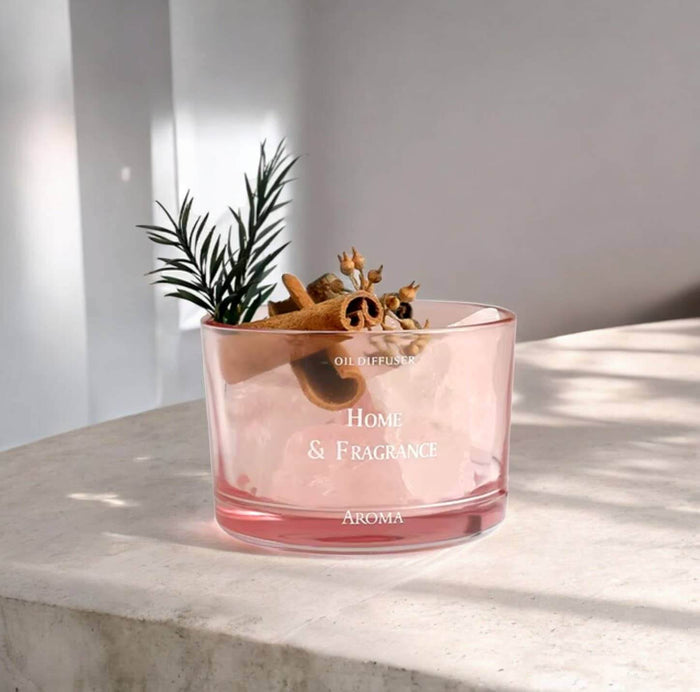Crystal Aroma Home Scent Stone Diffuser with floral arrangement in a stylish pink container.