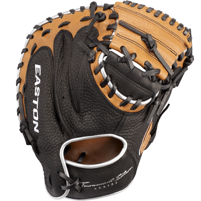 The Easton Tournament Elite 32.5" Baseball Catcher's Mitt: TEB2325 features a black and tan design with black lacing and "EASTON" in white on the thumb, plus detailed inner pocket stitching.