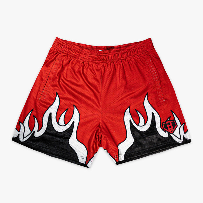 Flat lay of red mesh shorts with black and white flame hem graphic and BL101 diamond logo.