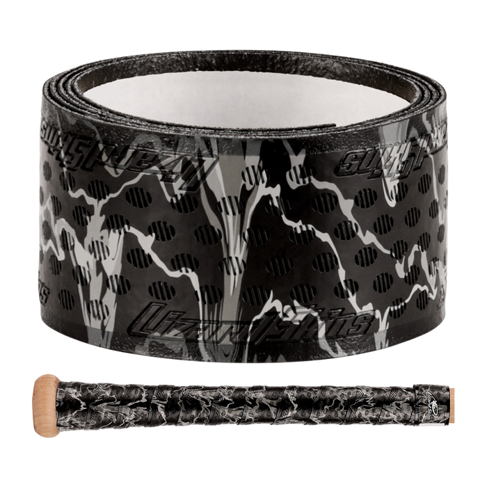 A roll of Lizard Skins DSP Ultra Camo 1.1mm Bat Grip is shown above a bat handle wrapped with the same Lizard Skins grip, featuring a textured, camo-inspired black and white pattern.