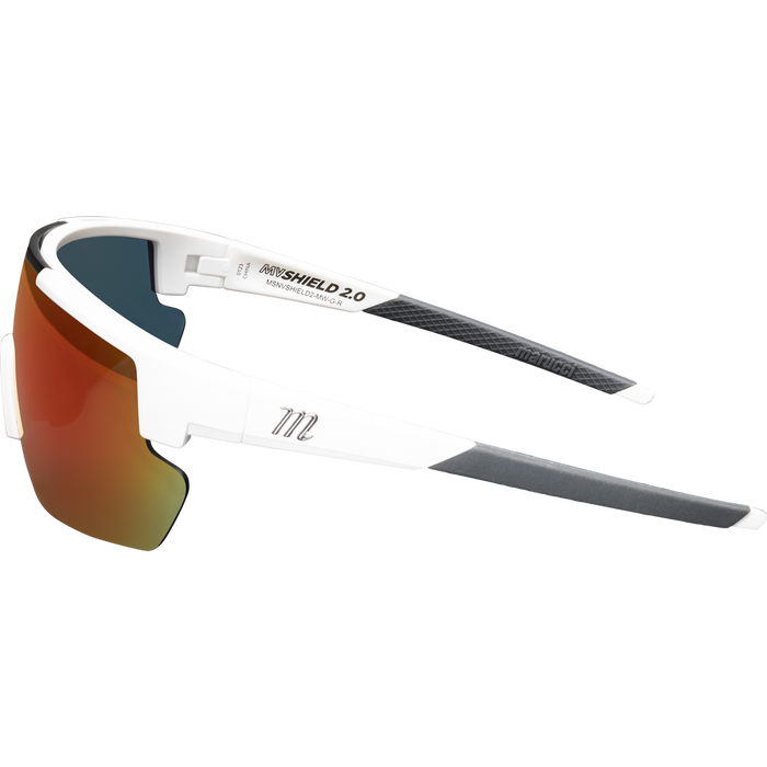 Side view of white Marucci Youth Shield 2.0 Performance Sunglasses (MSNVSHIELDY2) with gray and black arms, red-orange mirrored lenses, and a sleek angular frame—ideal on-field sunglasses for dynamic sports.