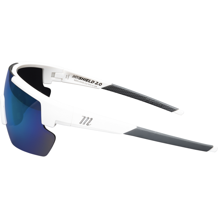 The Marucci Youth Shield 2.0 Performance Sunglasses (MSNVSHIELDY2) feature a white frame, black and gray arms, and blue mirrored semi-rimless lenses—ideal for young athletes. Shown from the side on a plain light gray background.