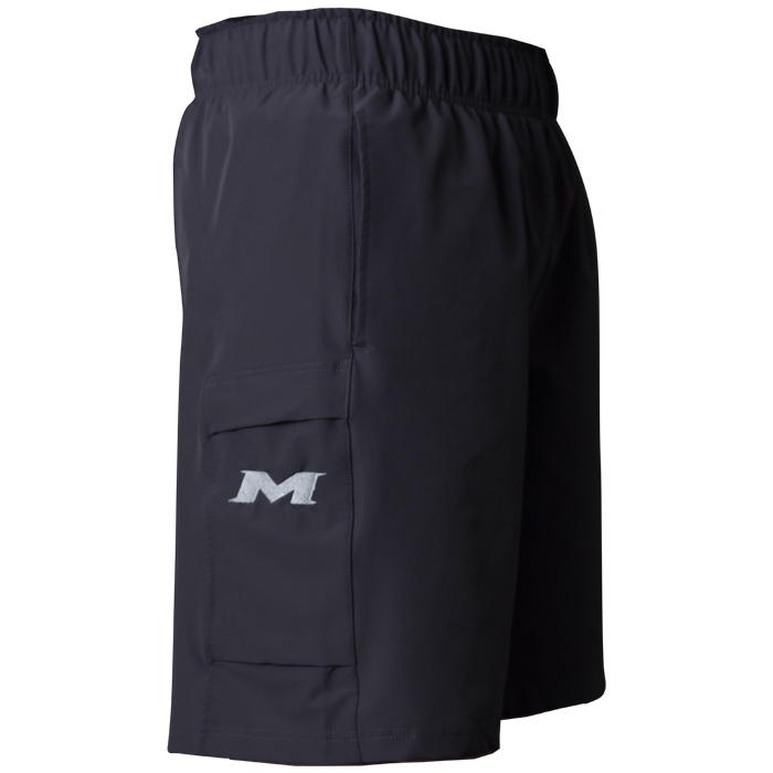 Side view of Miken Men's Slowpitch Shorts (MSPSM20) in black, featuring breathable poly-spandex, elastic waistband, and a side pocket with a white embroidered Miken 'M' logo.