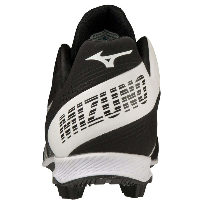 Back view of the black and white Mizuno Finch Lightrevo Junior Youth Girl's Molded Cleats (320666), featuring the bold white MIZUNO brand name and logo on the heel.