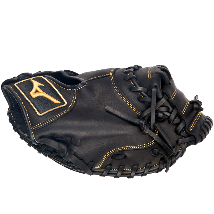 The Mizuno MVP Prime 34" Catcher's Mitt (GXC50PB4) is a black glove made from Bio Soft Leather with yellow stitching, a logo patch on the side, laced edges, and a deep pocket.