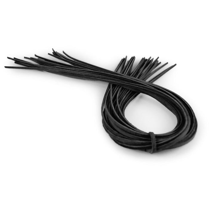 A single Nokona 1/4" Leather Glove Lace (LL-14), long and thin, is arranged in a loose oval with one end tied, resembling classic American-made glove laces.
