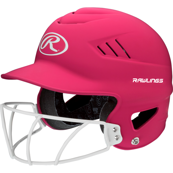 The Rawlings Coolflo Highlighter Matte Batting Helmet with Mask (RCFHLFG) features a bright pink finish, ventilation slits, a white face guard, and white Rawlings logos on the front and side.