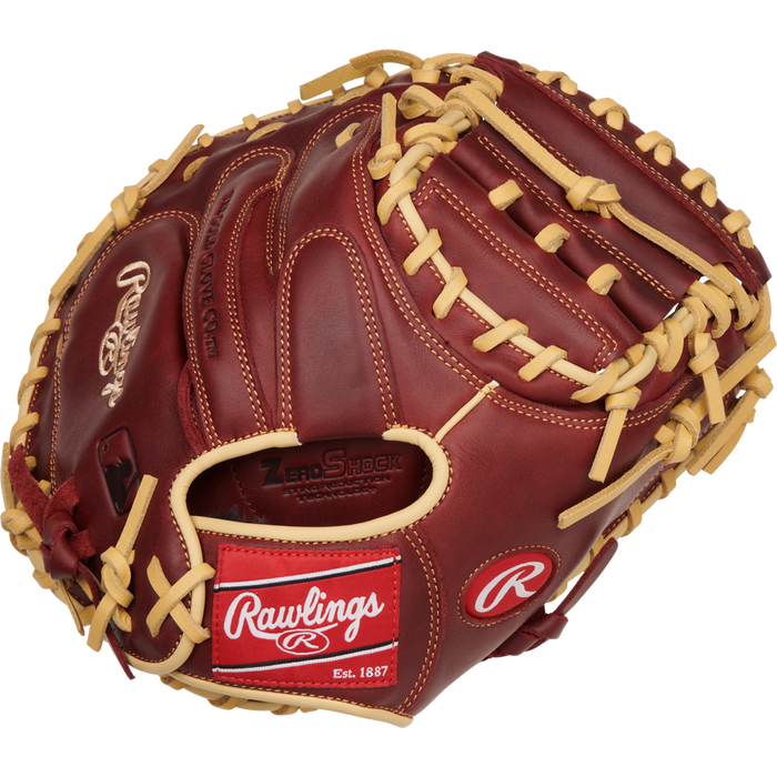 A Rawlings Sandlot 33" Baseball Catcher's Mitt (SCM33SS) in brown and tan features sturdy laces, oiled leather, and a visible Rawlings logo with a red "Rawlings Est. 1887" patch near the wrist area.