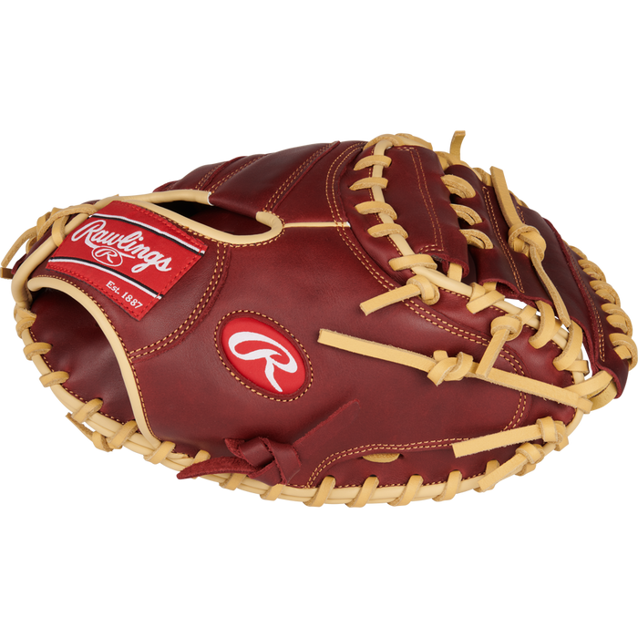 A Rawlings Sandlot 33" Baseball Catcher's Mitt (SCM33SS) by Rawlings, featuring brown oiled leather, tan laces, a red logo patch, and white stitching, is shown from the side on a plain white background.