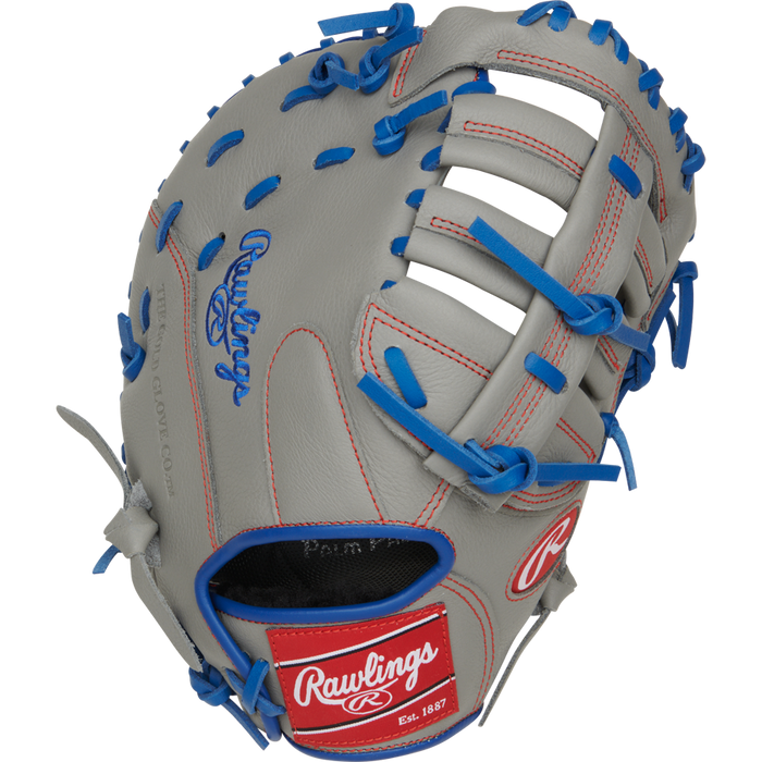 The Rawlings Select Pro Lite 11.5" Freddie Freeman First Base Mitt (SPL115FF) is a gray youth glove with blue laces, red stitching, and blue and red Rawlings logos. It features an open web design and visible finger slots.
