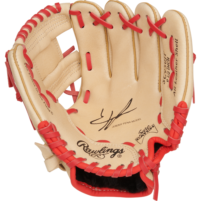 The Rawlings Sure Catch 9.5" Jeremy Pena Youth Baseball Glove (SC950JP) features tan leather, red laces, and stamped logos inside the palm.