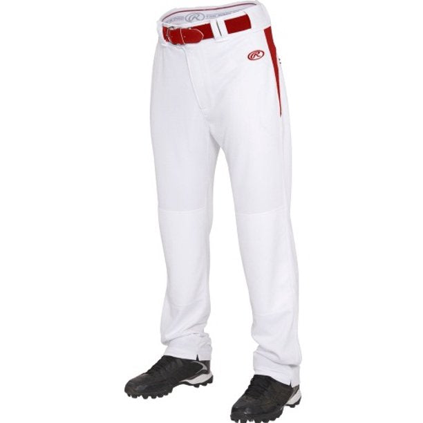 A person is shown from the waist down wearing Rawlings Youth BPVP2 Semi-Relaxed Baseball Pants (YBPVP2) in white with red accents and belt loops, paired with a red belt and black cleats. Only the lower half is visible.