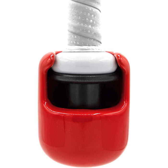 Close-up of a tennis racket handle with a red vibration dampener and white grip tape—similar in function to the Hitting Knob Bat Weight by Hitting Knob, which is designed to improve control and bat speed for baseball players.