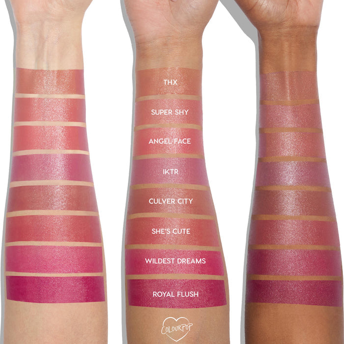 ColourPop Liquid Blush in THX swatched across three skin tones, showing a warm peachy-rose shade with a dewy sheen; additional rows compare Super Shy, Angel Face, IKTR, Culver City, She’s Cute, Wildest Dreams, and Royal Flush on the same arms.
