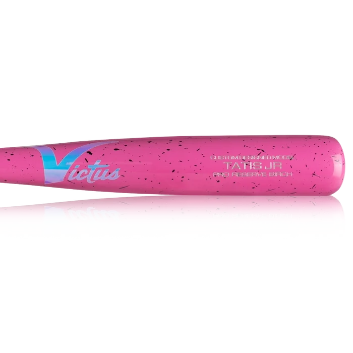 A close-up of the Victus TATIS JR Youth Pro Reserve Birch Wood Bat (VYRWBTATISJR) in pink with black speckles and "Victus" in white and blue on the barrel, highlighting its balanced feel.