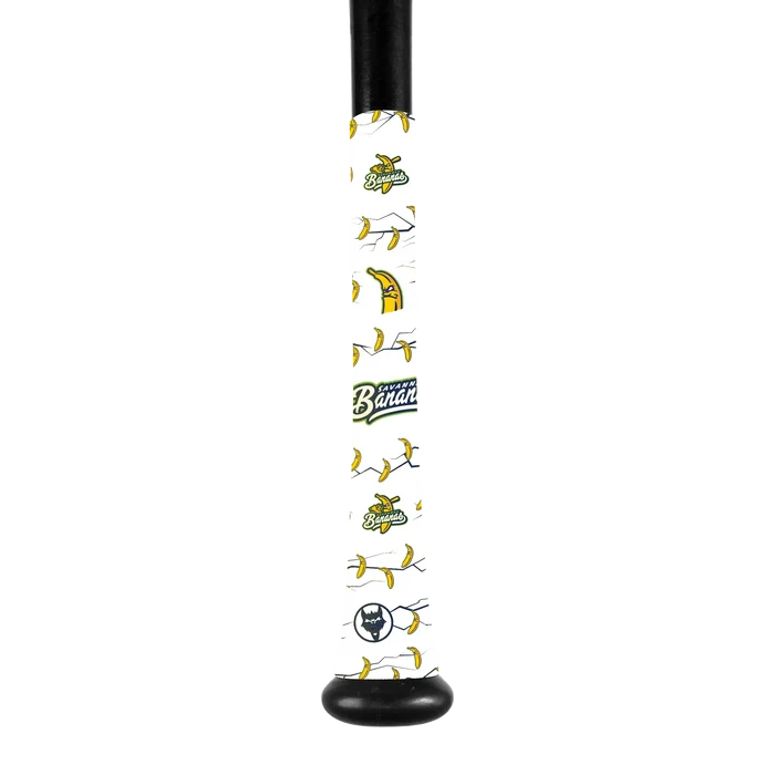 A close-up of a VukGripz Bat Grip Tape by VukGripz featuring cartoon bananas, a Banana Ball logo, and a small circular emblem at the end for optimum grip.