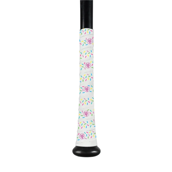 The VukGripz Bat Grip Tape by VukGripz features a black baseball bat handle wrap with a white background and pink frosted donuts with colorful sprinkles, providing optimum grip.